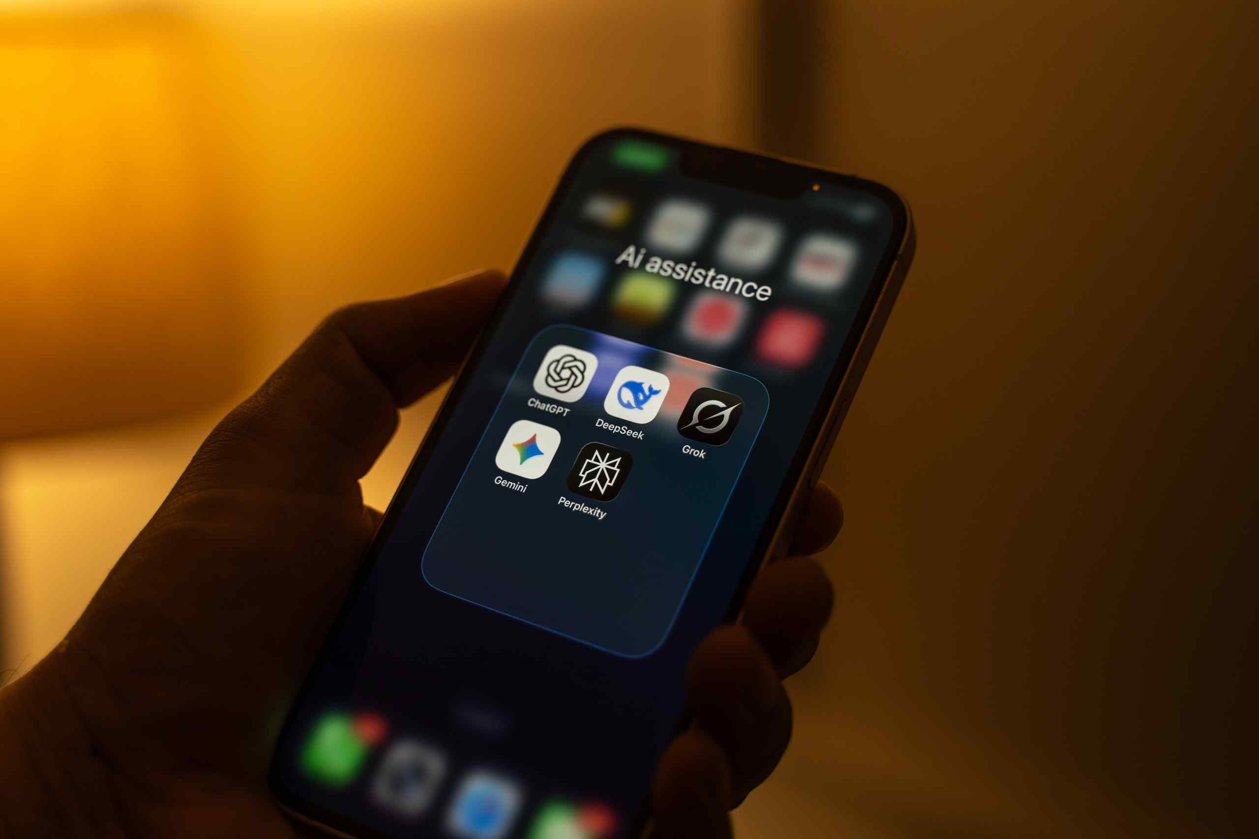 A smart phone with ChatGPT, Gemini and DeepSeek apps.